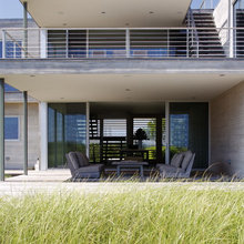 Beach house overhang and decks on roof