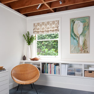 Inspiration for a small modern study in San Francisco with white walls, slate flooring, a freestanding desk and grey floors.