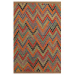 Bareens Designer Rugs - Modern Turkish Kilim Lani Hand-Woven Wool Rug - 5'9'' x 7'11'' - Elevate the elegance of your home with this stunning hand-woven tribal Kilim wool rug. Meticulously crafted on a loom by the Nomad Turkman people using hand-spun wool and 100% natural vegetable dyes, these rugs are recognized for their repetitive geometric patterns, incorporating naturalistic floral and traditional designs. The contemporary fashion palette results in bold, sharp patterns that are incredibly versatile, as the pattern is the same on both sides. These reversible rugs feature a lighter shade on one side and brighter colors on the other, providing versatility according to preference. These unique rugs are made by knotting short strands of different colors onto the warps and securing them by tightly pressing the wefts. The designs are created by interweaving the various colored wefts and warps. Kilims are known for their exceptional durability and versatility, making them truly unique rugs.  Product Details    Rug Size: 5'9'' x 7'11''  Material: 100% Wool  Style: Kilim, Flat Weave, Dhurrie, Turkish, Southwestern, Rustic, Tribal  Colors: Brown, Blue, Teal, Purple  Weave Type: Hand-Woven, Handmade  Pile Height: Less than 0.25 inch