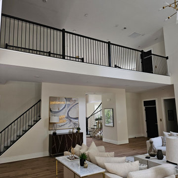 Project #130 | Curved Staircase with Wraparound Balcony