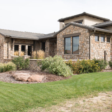 Traditional Exteriors Featuring Stone
