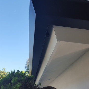 Huntington Beach California, White Fascia Wrap, Black 6 inch Angle Face Gutters