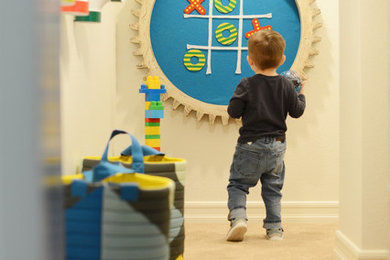 Inspiration for an eclectic gender-neutral carpeted and beige floor kids' room remodel in San Diego with white walls