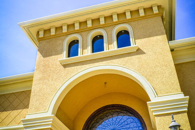 Photo of a large mediterranean entryway in Boise.