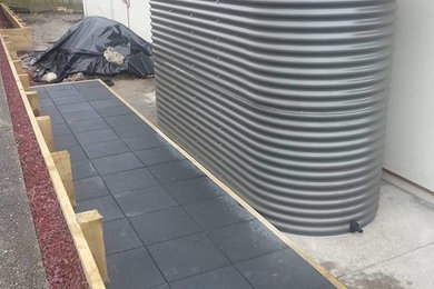 Large trendy exterior home photo in Auckland