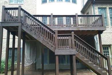 Inspiration for a large timeless wooden straight wood railing staircase remodel in Atlanta with wooden risers