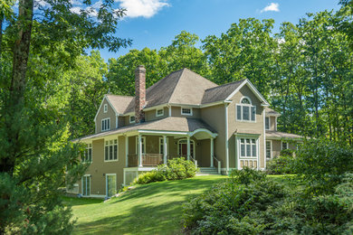Inspiration for a large timeless house exterior remodel in Boston