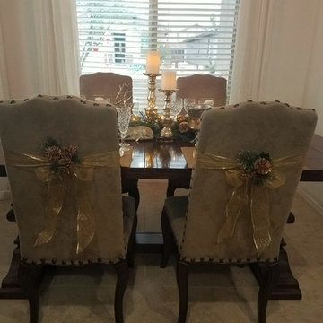 Christmas table with decorated chairs