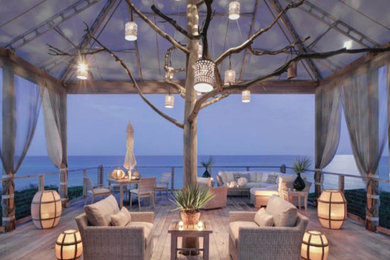 Example of a beach style patio design in Boston