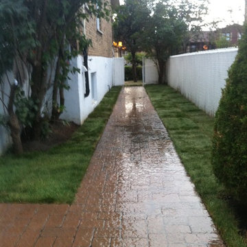 Side path construction over existing old path. Joining to rear patio !