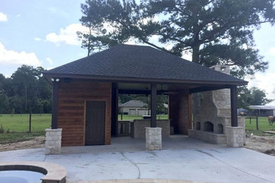 Patio kitchen - mid-sized traditional backyard concrete patio kitchen idea in Other