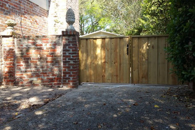 Mid-sized elegant red brick house exterior photo in Jacksonville