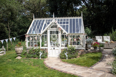 This is an example of a medium sized victorian detached greenhouse in Hampshire.