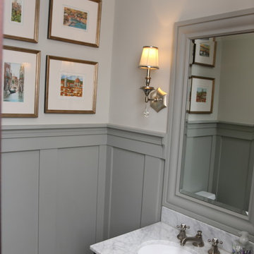 Elegant Traditional Powder Room with Gray Board and Batten, Marble Top Vanity an