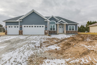 Example of a trendy home design design in Milwaukee