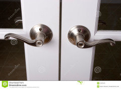 Door lever tips up or down