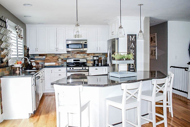 Example of a farmhouse kitchen design in Other