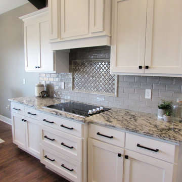 White Farmhouse Kitchen w/ Rustic Cathedral Ceilings