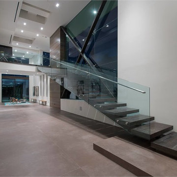 Benedict Canyon Beverly Hills luxury home modern open volume interior with stair