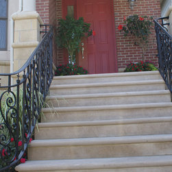Solid stone stairs with ornamental iron railing - Products