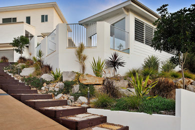 Photo of a contemporary home design in Wollongong.