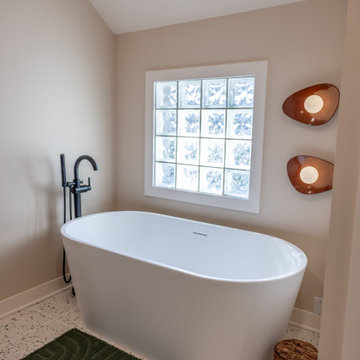 Primary & Guest Bathroom Remodel with Improved Layout and Heated Terrazzo Floors