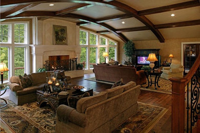 Living room - large traditional formal and open concept medium tone wood floor and brown floor living room idea in Chicago with black walls, a standard fireplace, a stone fireplace and a media wall