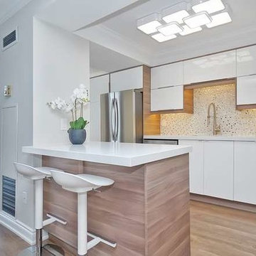 Condo kitchen counter top. Pure White Quartz.
