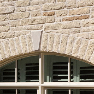 Spalding Tudor Brick Home featuring Sugarcane Brown Stone - South Carolina