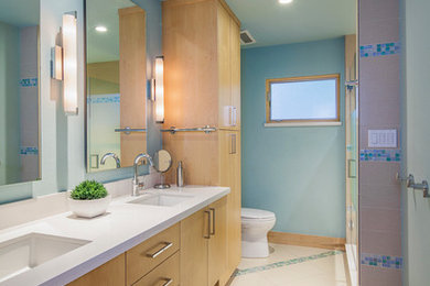 Trendy white tile and porcelain tile porcelain tile alcove shower photo in Austin with an undermount sink, flat-panel cabinets and quartz countertops