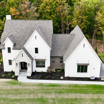 Formal Two-Story Nestled in the Woods