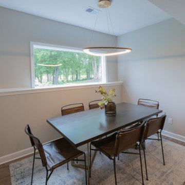 Lenexa, Kansas Basement Remodel with Speakeasy-Inspired Entertaining Bar