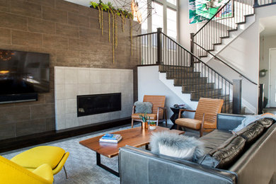 Family room - mid-century modern family room idea in Denver