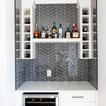 An elegant bar with wine racks for basement