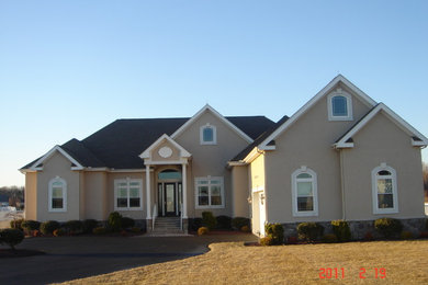Example of a beach style exterior home design in Other