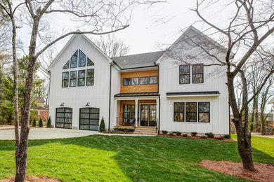 Inspiration for a farmhouse exterior home remodel in Charlotte