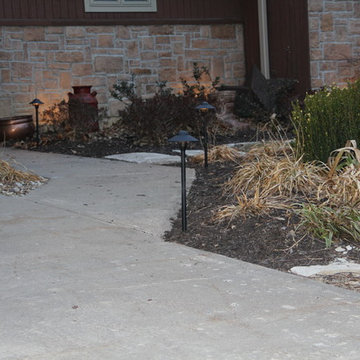 Deck lighting using low voltage under railing LED lights.