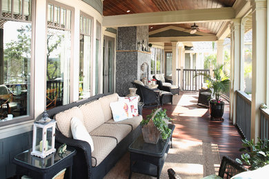 Design ideas for a traditional verandah in Charleston with a fire feature.