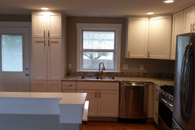 Example of a minimalist kitchen design in Seattle