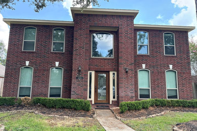 Traditional concrete fiberboard exterior home idea in Houston