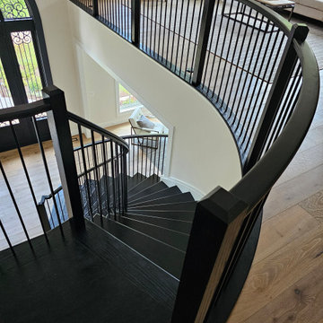 Project #130 | Curved Staircase with Wraparound Balcony