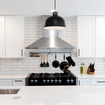 Rock Kitchen, Flooring and Custom Fireplace and Shelving Remodel