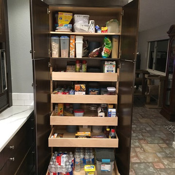 Pull-Out Pantry Features Ingenious Adjustable Roll-Out Shelves