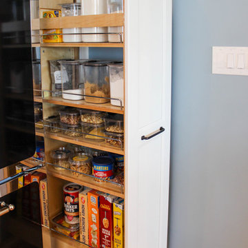 White and Gray Kitchen with Massive Storage Solutions