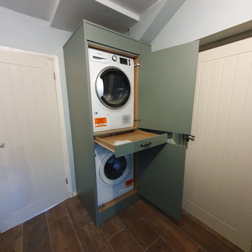 Dark Green Kitchen Installation with Oak Effect Worktops