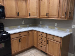 Light/White Countertops with Natural Maple Cabinets Picture Request