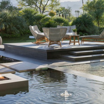 Serenity Indian Wells modern home luxury outdoor terrace with water and fire fea