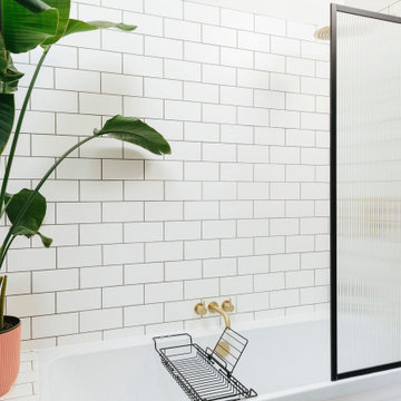 Pink & green bathroom with mix of tiles & patterns