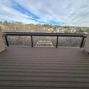 New composite deck with a custom dining rail to enjoy the beautiful view