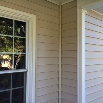 Charlotte, NC, upscale vinyl siding replacement by Belk Builders.